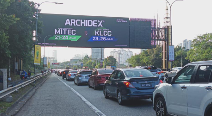 LED billboard showcasing Archidex event along KLCC highway Malaysia — Prism Media Hub out-of-home advertising